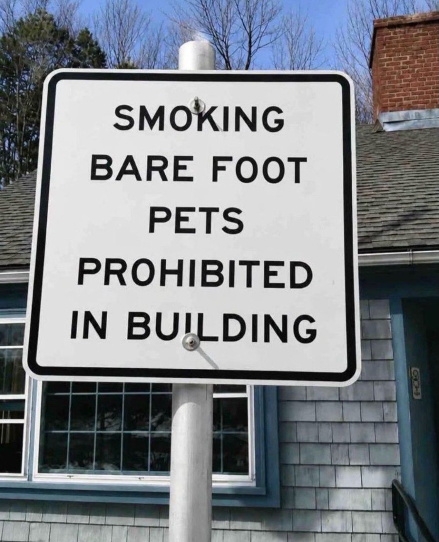 SMOKING BARE FOOT PETS PROHIBITED IN BUILDING